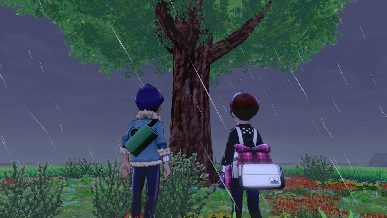 Hop and player standing by a tree