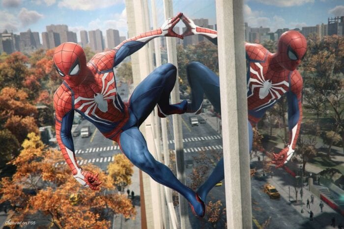 spider-man leaning on a building